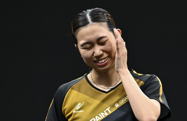 (260119) -- DOHA, Jan. 19, 2026 (Xinhua) -- Sato Hitomi of Japan reacts during the women's Singles final match against Zhu Yuling of China's Macao at the WTT Star Contender Doha 2026 in Doha, Qatar, on Jan. 18, 2026. (Photo by Nikku/Xinhua)