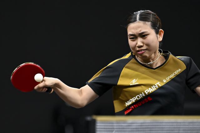 (260119) -- DOHA, Jan. 19, 2026 (Xinhua) -- Sato Hitomi of Japan hits a return during the women's Singles final match against Zhu Yuling of China's Macao at the WTT Star Contender Doha 2026 in Doha, Qatar, on Jan. 18, 2026. (Photo by Nikku/Xinhua)