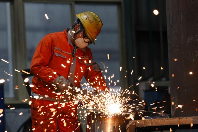 (260119) -- BEIJING, Jan. 19, 2026 (Xinhua) -- A technician welds components at a manufacturing base of China Railway Science & Industry Group Co., Ltd. in Wuhan, central China's Hubei Province, Jan. 19, 2026. China's gross domestic product (GDP) grew 5 percent year on year in 2025, meeting the annual target of around 5 percent, official data showed Monday.
  China's GDP reached a record of 140.1879 trillion yuan (about 20.01 trillion U.S. dollars) last year, data from the National Bureau of Statistics (NBS) revealed. (Photo by Zhao Jun/Xinhua)