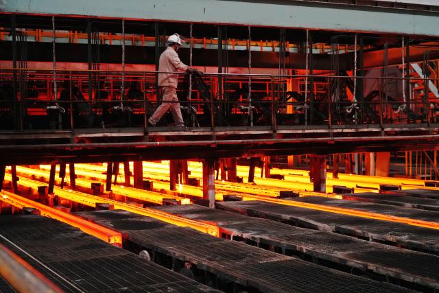 (260119) -- BEIJING, Jan. 19, 2026 (Xinhua) -- A worker works at an iron and steel company in Dazhou, southwest China's Sichuan Province, Jan. 19, 2026. China's gross domestic product (GDP) grew 5 percent year on year in 2025, meeting the annual target of around 5 percent, official data showed Monday.
  China's GDP reached a record of 140.1879 trillion yuan (about 20.01 trillion U.S. dollars) last year, data from the National Bureau of Statistics (NBS) revealed. (Photo by Deng Liangkui/Xinhua)