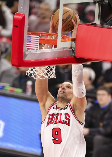 (260119) -- CHICAGO, Jan. 19, 2026 (Xinhua) -- Chicago Bulls' Nikola Vucevic dunks during the 2025-2026 NBA regular season basketball game between Brooklyn Nets and Chicago Bulls at United Center in Chicago, the United States, Jan. 18, 2026. (Photo by Joel Lerner/Xinhua)
