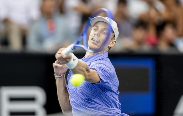 (260119) -- MELBOURNE, Jan. 19, 2026 (Xinhua) -- Denis Shapovalov hits a return during the men's singles 1st round match between Bu Yunchaokete of China and Denis Shapovalov of Canada at the Australian Open tennis tournament in Melbourne, Australia, Jan. 19, 2026. (Photo by Hu Jingchen/Xinhua)