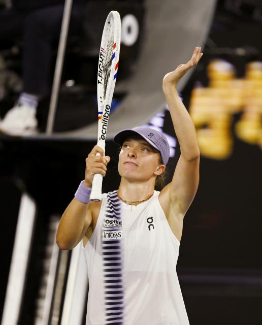 (260119) -- MELBOURNE, Jan. 19, 2026 (Xinhua) -- Iga Swiatek reacts after the women's singles 1st round match between Yuan Yue of China and Iga Swiatek of Poland at the Australian Open tennis tournament in Melbourne, Australia, Jan. 19, 2026. (Photo by Wang Shen/Xinhua)