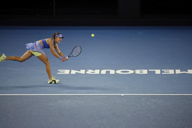(260119) -- MELBOURNE, Jan. 19, 2026 (Xinhua) -- Yuan Yue hits a return during the women's singles 1st round match between Yuan Yue of China and Iga Swiatek of Poland at the Australian Open tennis tournament in Melbourne, Australia, Jan. 19, 2026. (Photo by Wang Shen/Xinhua)