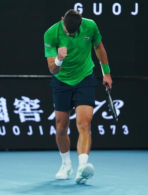 (260119) -- MELBOURNE, Jan. 19, 2026 (Xinhua) -- Novak Djokovic reacts during the men's singles 1st round match between Pedro Martinez of Spain and Novak Djokovic of Serbia at the Australian Open tennis tournament in Melbourne, Australia, Jan. 19, 2026. (Photo by Wang Shen/Xinhua)