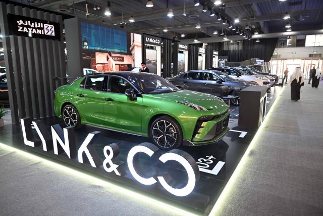 (260119) -- HAWALLI GOVERNORATE, Jan. 19, 2026 (Xinhua) -- People visit the booth of Chinese car brand Lynk&Co during the Auto Show in Hawalli Governorate, Kuwait, Jan. 19, 2026. The Auto Show kicked off in Kuwait's Hawalli Governorate on Monday with the participation of more than 120 cars from around 30 car dealers showing 40 car brands. The event will last for 6 days from Jan. 19 to 24. (Photo by Asad/Xinhua)