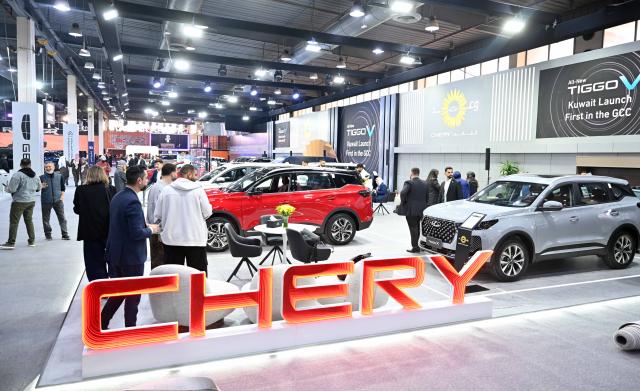 (260119) -- HAWALLI GOVERNORATE, Jan. 19, 2026 (Xinhua) -- People visit the Auto Show in Hawalli Governorate, Kuwait, Jan. 19, 2026. The Auto Show kicked off in Kuwait's Hawalli Governorate on Monday with the participation of more than 120 cars from around 30 car dealers showing 40 car brands. The event will last for 6 days from Jan. 19 to 24. (Photo by Asad/Xinhua)