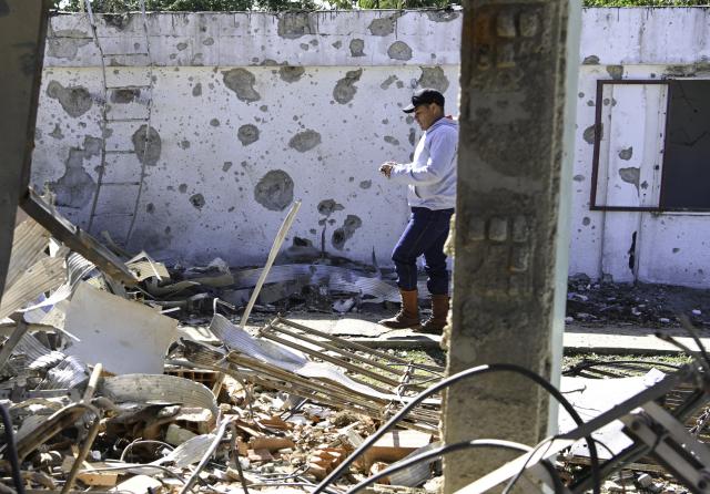 (260119) -- MIRANDA STATE(VENEZUELA), Jan. 19, 2026 (Xinhua) -- A staff member of the Venezuelan Institute for Scientific Research inspects a damaged facility in Miranda State, Venezuela, Jan. 19, 2026. As Venezuela's premier hub for scientific research and talent cultivation, The Venezuelan Institute for Scientific Research suffered significant damage during the U.S. attack on Venezuela which caused damage to buildings and precision scientific equipment in the early hours of January 3. (Xinhua/Ding Hongfa)
