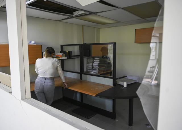 (260119) -- MIRANDA STATE(VENEZUELA), Jan. 19, 2026 (Xinhua) -- A staff member of the Venezuelan Institute for Scientific Research speaks on a phone at the Mathematics Center in Miranda State, Venezuela, Jan. 19, 2026. As Venezuela's premier hub for scientific research and talent cultivation, The Venezuelan Institute for Scientific Research suffered significant damage during the U.S. attack on Venezuela which caused damage to buildings and precision scientific equipment in the early hours of January 3. (Xinhua/Ding Hongfa)
