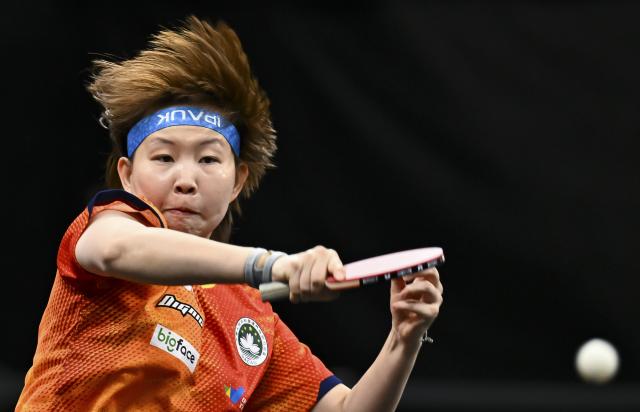 (260120) -- BEIJING, Jan. 20, 2026 (Xinhua) -- Zhu Yuling of China's Macao hits a return during the women's Singles final match against Sato Hitomi of Japan at the WTT Star Contender Doha 2026 in Doha, Qatar, on Jan. 18, 2026. (Photo by Nikku/Xinhua)