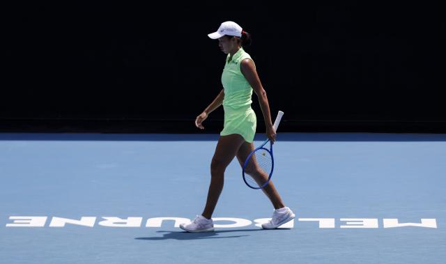 (260120) -- MELBOURNE, Jan. 20, 2026 (Xinhua) -- Zhang Shuai of China reacts during the women's singles 1st round match against Taylah Preston of Australia at the Australian Open tennis tournament in Melbourne, Australia, Jan. 20, 2026. (Xinhua/Ma Ping)