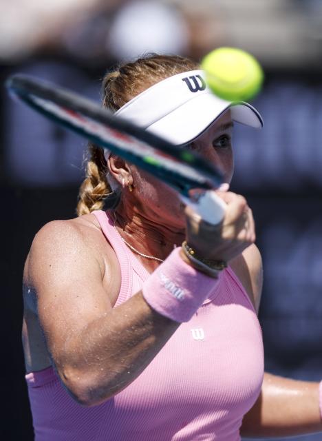 (260120) -- MELBOURNE, Jan. 20, 2026 (Xinhua) -- Taylah Preston of Australia hits a return during the women's singles 1st round match against Zhang Shuai of China at the Australian Open tennis tournament in Melbourne, Australia, Jan. 20, 2026. (Xinhua/Ma Ping)