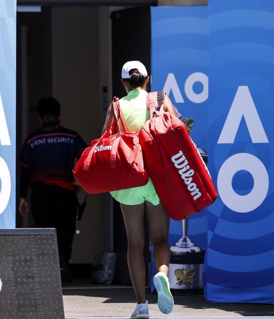 (260120) -- MELBOURNE, Jan. 20, 2026 (Xinhua) -- Zhang Shuai of China leaves the court after the women's singles 1st round match against Taylah Preston of Australia at the Australian Open tennis tournament in Melbourne, Australia, Jan. 20, 2026. (Xinhua/Ma Ping)