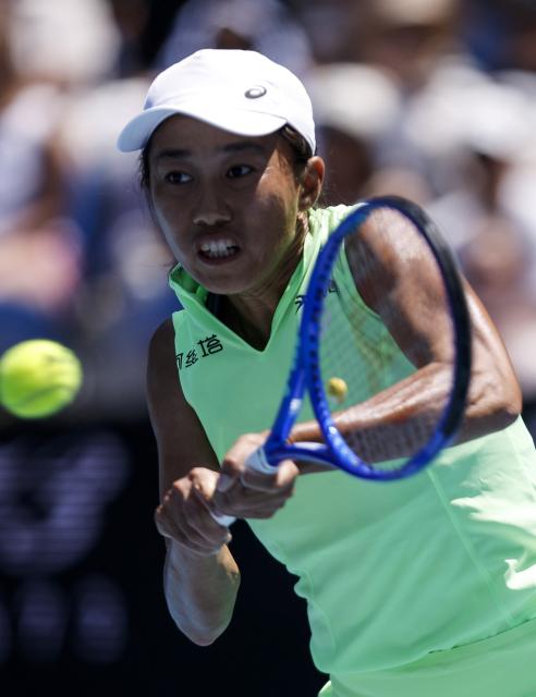(260120) -- MELBOURNE, Jan. 20, 2026 (Xinhua) -- Zhang Shuai of China hits a return during the women's singles 1st round match against Taylah Preston of Australia at the Australian Open tennis tournament in Melbourne, Australia, Jan. 20, 2026. (Xinhua/Ma Ping)
