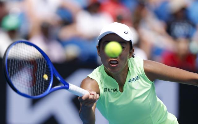 (260120) -- MELBOURNE, Jan. 20, 2026 (Xinhua) -- Zhang Shuai of China hits a return during the women's singles 1st round match against Taylah Preston of Australia at the Australian Open tennis tournament in Melbourne, Australia, Jan. 20, 2026. (Xinhua/Ma Ping)