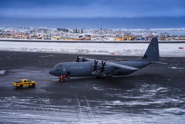 (260120) -- NUUK, Jan. 20, 2026 (Xinhua) -- This photo taken on Jan. 15, 2026 shows a Hercules aircraft belonged to the Danish Defense at the Nuuk Airport in Nuuk, capital of Greenland, an autonomous territory of Denmark. Greenland, the world's largest island, is a self-governing territory within the Kingdom of Denmark, with Copenhagen retaining control over defense and foreign policy. The United States maintains a military base on the island. Since returning to office in 2025, Trump has repeatedly expressed a desire to "obtain" Greenland.  
  Trump has accelerated his push to acquire the island. On Saturday, Trump announced that the United States would impose a 10 percent tariff from Feb. 1 on goods from Denmark, Norway, Sweden, France, Germany, Britain, the Netherlands and Finland, and raise the levy to 25 percent from the beginning of June unless a deal is reached for the United States to purchase the territory. (Photo by Anders Kongshaug/Xinhua)