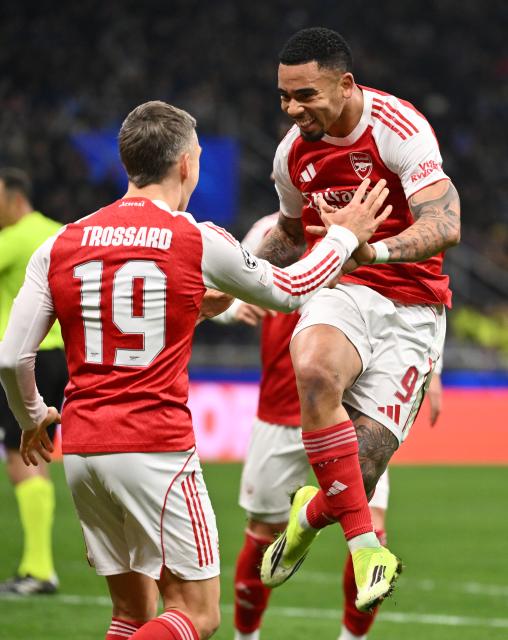 (260121) -- MILAN, Jan. 21, 2026 (Xinhua) -- Arsenal's Gabriel Jesus (R) celebrates his second goal with teammate Leandro Trossard during the UEFA Champions League match between Inter Milan and Arsenal in Milan, Italy, Jan. 20, 2026. (Photo by Alberto Lingria/Xinhua)