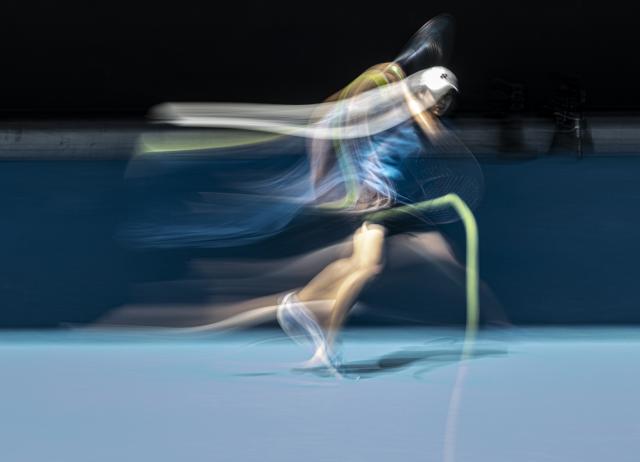 (260121) -- MELBOURNE, Jan. 21, 2026 (Xinhua) -- Bai Zhuoxuan of China hits a return during the women's singles 2nd round match against Aryna Sabalenka of Belarus at the Australian Open tennis tournament in Melbourne, Australia, Jan. 21, 2026. (Photo by Hu Jingchen/Xinhua)