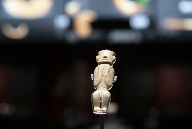 (260121) -- MA'ANSHAN, Jan. 21, 2026 (Xinhua) -- This photo taken on May 16, 2025 shows a jade figurine on display at the Lingjiatan Site Museum in Hanshan County, Ma'anshan, east China's Anhui Province. Dating back some 5,300 to 5,800 years, the Lingjiatan relic site in east China's Anhui was discovered in 1985. It is known for the jadeware unearthed there. The findings include jade artifacts in various shapes, offering a peek into the spirits and aesthetics of a prehistoric Chinese jade culture. (Xinhua/Zhang Duan)