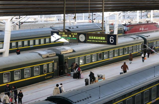(260121) -- BEIJING, Jan. 21, 2026 (Xinhua) -- Passengers prepare for boarding on a platform at the Beijing West Railway Station in Beijing, capital of China, on Jan. 21, 2026. The Beijing West Railway Station marked its 30th anniversary on Wednesday. Over the past three decades, this modern transport hub has handled more than 1.96 billion passenger trips, standing as a witness to China's development and the evolution of its railway network. (Xinhua/Zhang Chenlin)