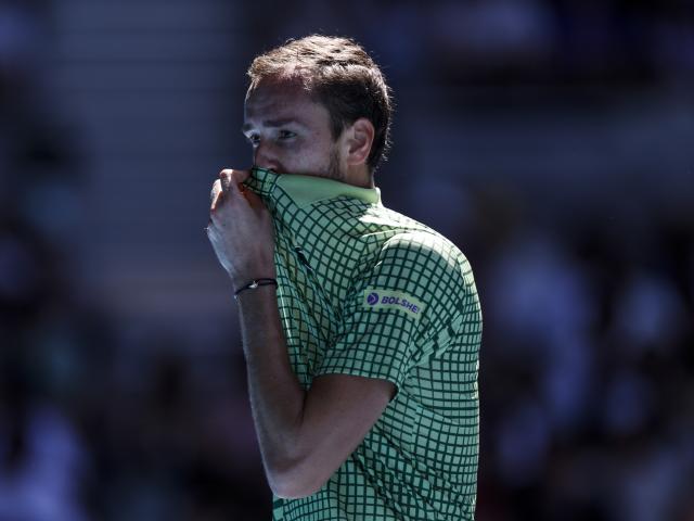 (260121) -- MELBOURNE, Jan. 21, 2026 (Xinhua) -- Daniil Medvedev of Russia reacts during the men's singles 2nd round match between Daniil Medvedev of Russia and Quentin Halys of France at the Australian Open tennis tournament in Melbourne, Australia, Jan. 21, 2026. (Xinhua/Ma Ping)