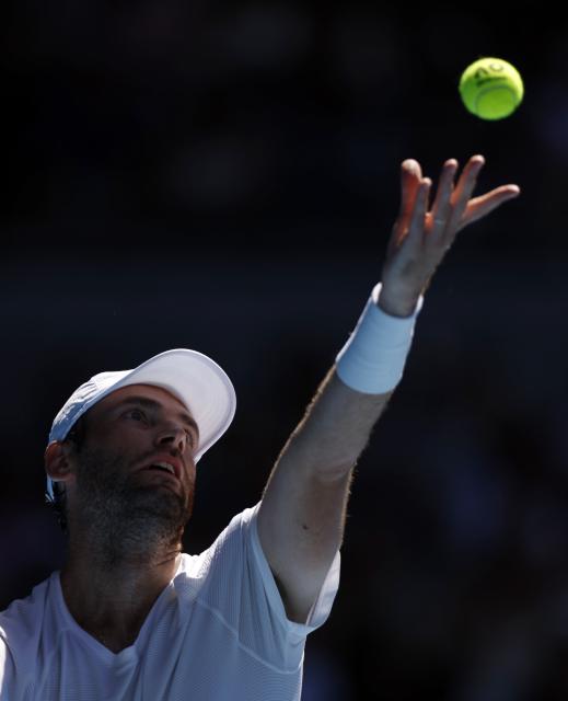 (260121) -- MELBOURNE, Jan. 21, 2026 (Xinhua) -- Quentin Halys of France serves during the men's singles 2nd round match between Daniil Medvedev of Russia and Quentin Halys of France at the Australian Open tennis tournament in Melbourne, Australia, Jan. 21, 2026. (Xinhua/Ma Ping)