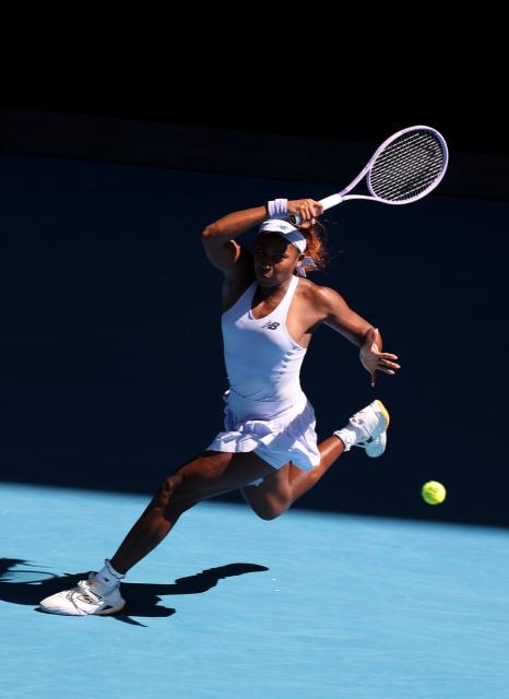 (260121) -- MELBOURNE, Jan. 21, 2026 (Xinhua) -- Coco Gauff of the United States hits a return during the women's singles 2nd round match against Olga Danilovic of Serbia at the Australian Open tennis tournament in Melbourne, Australia, Jan. 21, 2026. (Xinhua/Ma Ping)