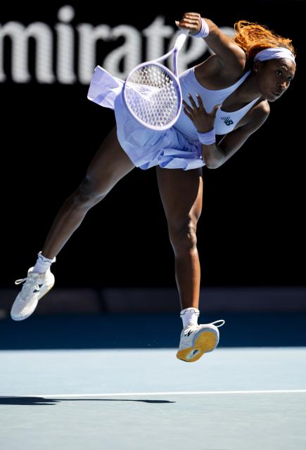 (260121) -- MELBOURNE, Jan. 21, 2026 (Xinhua) -- Coco Gauff of the United States serves during the women's singles 2nd round match against Olga Danilovic of Serbia at the Australian Open tennis tournament in Melbourne, Australia, Jan. 21, 2026. (Photo by Hu Jingchen/Xinhua)
