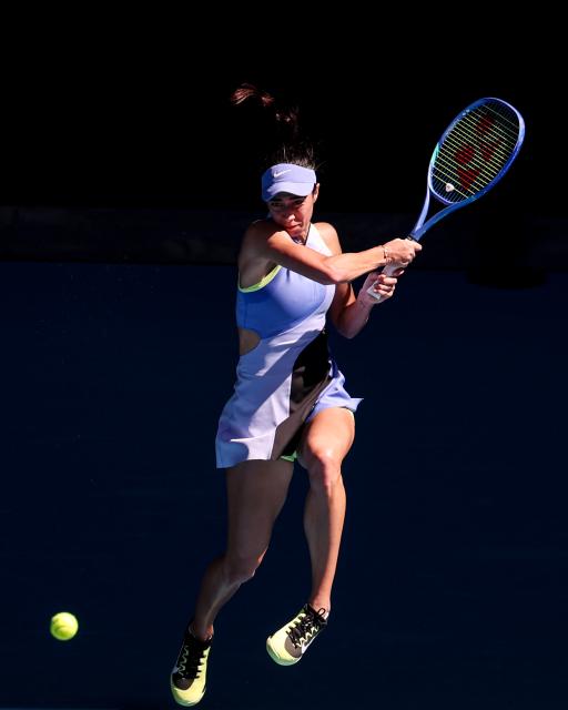 (260121) -- MELBOURNE, Jan. 21, 2026 (Xinhua) -- Olga Danilovic of Serbia hits a return during the women's singles 2nd round match against Coco Gauff of the United States at the Australian Open tennis tournament in Melbourne, Australia, Jan. 21, 2026. (Xinhua/Ma Ping)
