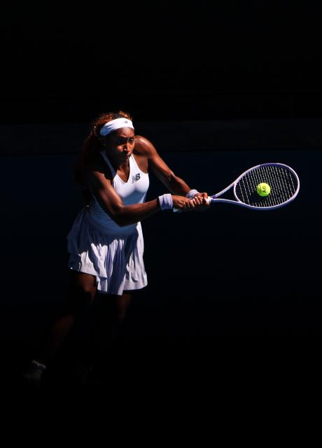 (260121) -- MELBOURNE, Jan. 21, 2026 (Xinhua) -- Coco Gauff of the United States hits a return during the women's singles 2nd round match against Olga Danilovic of Serbia at the Australian Open tennis tournament in Melbourne, Australia, Jan. 21, 2026. (Xinhua/Ma Ping)