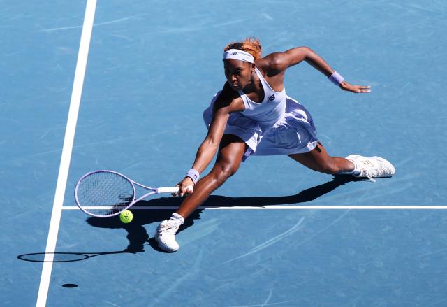(260121) -- MELBOURNE, Jan. 21, 2026 (Xinhua) -- Coco Gauff of the United States hits a return during the women's singles 2nd round match against Olga Danilovic of Serbia at the Australian Open tennis tournament in Melbourne, Australia, Jan. 21, 2026. (Xinhua/Ma Ping)