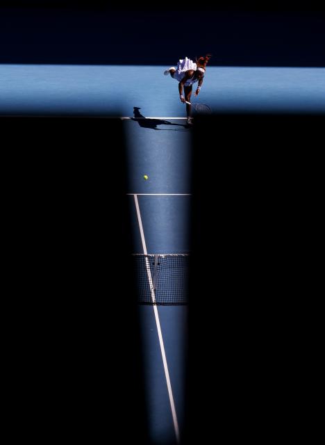 (260121) -- MELBOURNE, Jan. 21, 2026 (Xinhua) -- Coco Gauff of the United States hits a return during the women's singles 2nd round match against Olga Danilovic of Serbia at the Australian Open tennis tournament in Melbourne, Australia, Jan. 21, 2026. (Xinhua/Ma Ping)