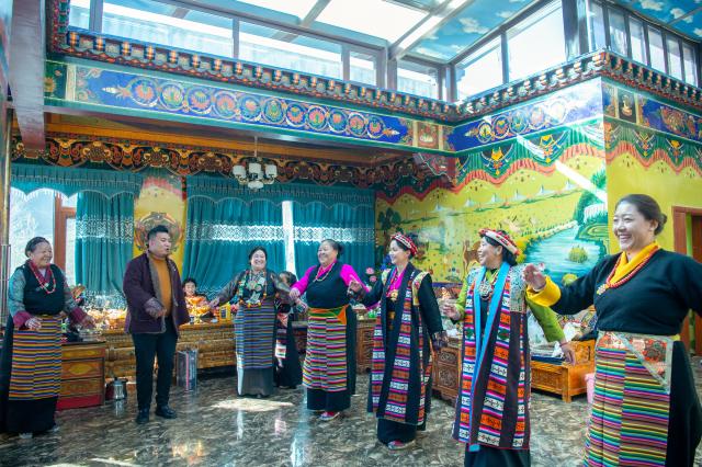 (260121) -- XIGAZE, Jan. 21, 2026 (Xinhua) -- Villagers are pictured during a celebration of the farmers' New Year in Chusong Village of Nyarixung Township in Xigaze, southwest China's Xizang Autonomous Region, Jan. 20, 2026. Locals in Xigaze celebrate the farmers' New Year on the first day of the twelfth month of the Tibetan calendar. (Photo by Tenzin Norbu/Xinhua)