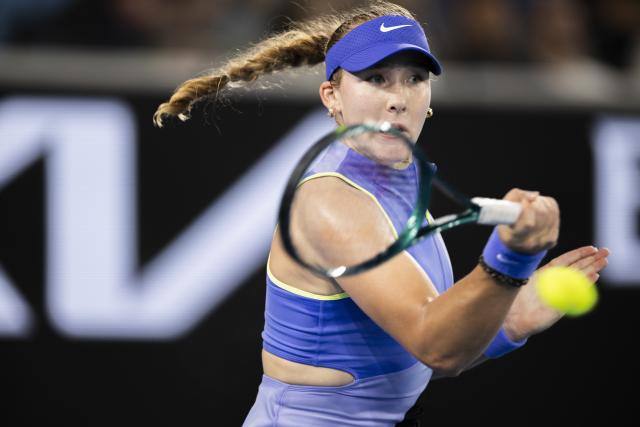 (260121) -- MELBOURNE, Jan. 21, 2026 (Xinhua) -- Mirra Andreeva hits a return during the women's singles 2nd round match between Mirra Andreeva of Russia and Maria Sakkari of Greece at the Australian Open tennis tournament in Melbourne, Australia, Jan. 21, 2026. (Photo by Hu Jingchen/Xinhua)