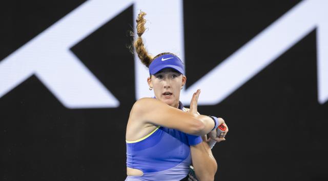 (260121) -- MELBOURNE, Jan. 21, 2026 (Xinhua) -- Mirra Andreeva hits a return during the women's singles 2nd round match between Mirra Andreeva of Russia and Maria Sakkari of Greece at the Australian Open tennis tournament in Melbourne, Australia, Jan. 21, 2026. (Photo by Hu Jingchen/Xinhua)