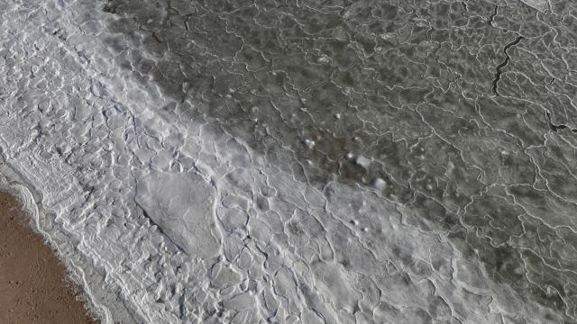 (260121) -- HULUDAO, Jan. 21, 2026 (Xinhua) -- A drone photo taken on Jan. 21, 2026 shows a view over sea ice in Suizhong County of Huludao City, northeast China's Liaoning Province. (Xinhua/Pan Yulong)