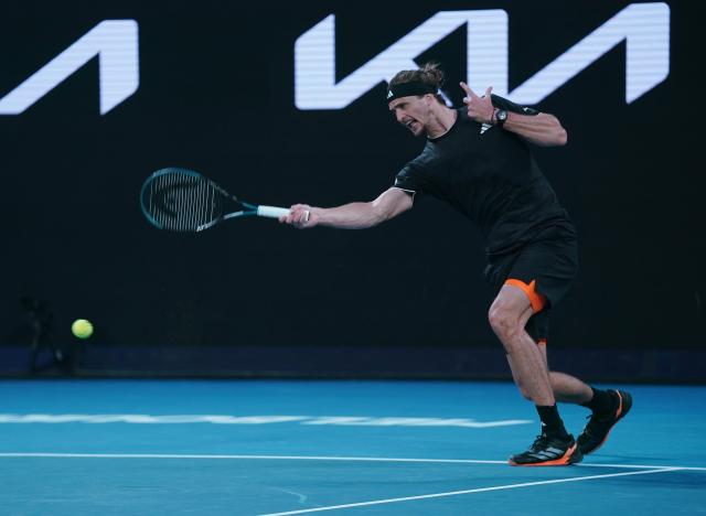 (260121) -- MELBOURNE, Jan. 21, 2026 (Xinhua) -- Alexander Zverev hits a return during the men's singles 2nd round match between Alexander Zverev of Germany and Alexandre Muller of France at the Australian Open tennis tournament in Melbourne, Australia, Jan. 21, 2026. (Photo by Wang Shen/Xinhua)