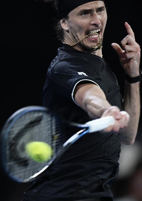 (260121) -- MELBOURNE, Jan. 21, 2026 (Xinhua) -- Alexander Zverev hits a return during the men's singles 2nd round match between Alexander Zverev of Germany and Alexandre Muller of France at the Australian Open tennis tournament in Melbourne, Australia, Jan. 21, 2026. (Photo by Wang Shen/Xinhua)