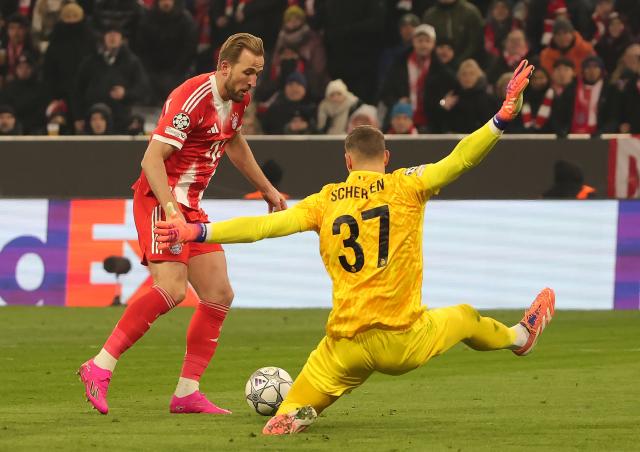 (260122) -- MUNICH, Jan. 22, 2026 (Xinhua) -- Kjell Scherpen (R), goalkeeper of Union Saint-Gilloise, defends Harry Kane of Bayern Munich during the UEFA Champions League match between Bayern Munich and Union Saint-Gilloise in Munich, Germany, Jan. 21, 2026. (Photo by Philippe Ruiz/Xinhua)