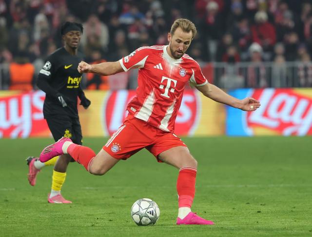 (260122) -- MUNICH, Jan. 22, 2026 (Xinhua) -- Harry Kane (front) of Bayern Munich kicks the ball during the UEFA Champions League match between Bayern Munich and Union Saint-Gilloise in Munich, Germany, Jan. 21, 2026. (Photo by Philippe Ruiz/Xinhua)