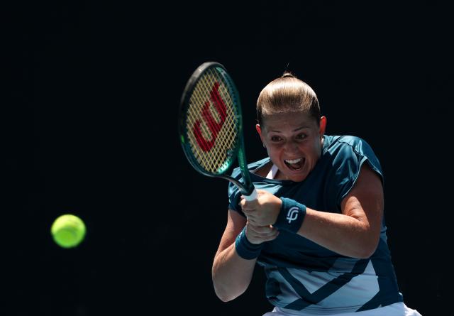 (260122) -- MELBOURNE, Jan. 22, 2026 (Xinhua) -- Jelena Ostapenko of Latvia hits a return during the women's singles 2nd round match against Wang Xinyu of China at the Australian Open tennis tournament in Melbourne, Australia, Jan. 22, 2026. (Xinhua/Ma Ping)