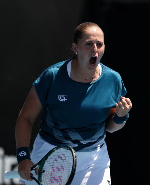 (260122) -- MELBOURNE, Jan. 22, 2026 (Xinhua) -- Jelena Ostapenko of Latvia reacts during the women's singles 2nd round match against Wang Xinyu of China at the Australian Open tennis tournament in Melbourne, Australia, Jan. 22, 2026. (Xinhua/Ma Ping)