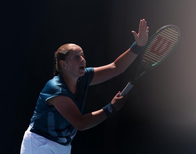 (260122) -- MELBOURNE, Jan. 22, 2026 (Xinhua) -- Jelena Ostapenko of Latvia reacts during the women's singles 2nd round match against Wang Xinyu of China at the Australian Open tennis tournament in Melbourne, Australia, Jan. 22, 2026. (Xinhua/Ma Ping)