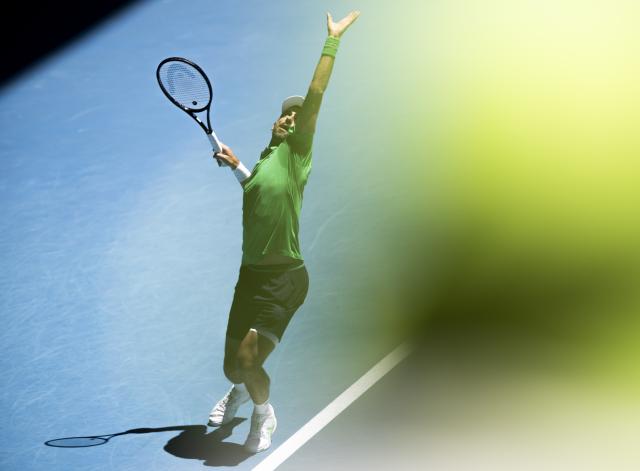 (260122) -- MELBOURNE, Jan. 22, 2026 (Xinhua) -- Novak Djokovic serves during the men's singles 2nd round match between Novak Djokovic of Serbia and Francesco Maestrelli of Italy at the Australian Open tennis tournament in Melbourne, Australia, Jan. 22, 2026. (Photo by Hu Jingchen/Xinhua)