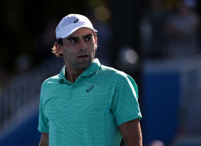 (260122) -- MELBOURNE, Jan. 22, 2026 (Xinhua) -- Eliot Spizzirri reacts during the men's singles 2nd round match between Wu Yibing of China and Eliot Spizzirri of the United States at the Australian Open tennis tournament in Melbourne, Australia, Jan. 22, 2026. (Xinhua/Ma Ping)