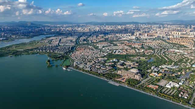 (260122) -- KUNMING, Jan. 22, 2026 (Xinhua) -- An aerial drone photo taken on Sept. 3, 2025 shows the scenery of Dianchi Lake in Kunming City, southwest China's Yunnan Province. The water quality in Dianchi Lake has been maintaining on high quality level for eight consecutive years, according to the Dianchi Lake administration bureau. (Xinhua/Peng Yikai)