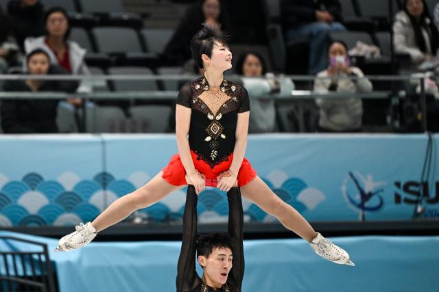 (260122) -- BEIJING, Jan. 22, 2026 (Xinhua) -- Ryom Tae Ok (top) and Han Kum Chol of the Democratic People's Republic of Korea (DPRK) perform during the pairs short program at the ISU Four Continents Figure Skating Championships in Beijing, China, Jan. 22, 2026. (Xinhua/Ju Huanzong)