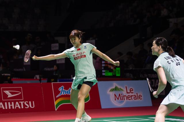 (260122) -- JAKARTA, Jan. 22, 2026 (Xinhua) -- Luo Xumin/Wang Yiduo (L) of China compete during the women's doubles round of 16 match between Luo Xumin/Wang Yiduo of China and Fan Ka Yan/Yau Mau Ying of China's Hong Kong at the Indonesia Masters 2026 badminton tournament in Jakarta, Indonesia, Jan. 22, 2026. (Xinhua/Veri Sanovri)