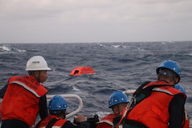(260123) -- HUANGYAN DAO, Jan. 23, 2026 (Xinhua) -- Members of the China Coast Guard carry out a rescue operation after a foreign cargo ship capsized in the territorial waters of south China's Huangyan Dao, Jan. 23, 2026. China Coast Guard (CCG) has saved 13 Filipino crew members from a shipwreck in the South China Sea, the CCG said on Friday.
   In the early hours of Friday, the CCG received a report that a foreign cargo ship capsized 55 nautical miles northwest of China's Huangyan Dao, with 21 Filipino crew members on board.
   Upon receiving the report, the CCG dispatched two vessels to conduct rescue operations.
   The rescue efforts are still underway, the CCG added. (China Coast Guard/Handout via Xinhua)