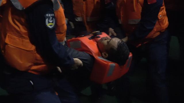 (260123) -- HUANGYAN DAO, Jan. 23, 2026 (Xinhua) -- A Filipino crew member is rescued by the China Coast Guard after a foreign cargo ship capsized in the territorial waters of south China's Huangyan Dao, Jan. 23, 2026. China Coast Guard (CCG) has saved 13 Filipino crew members from a shipwreck in the South China Sea, the CCG said on Friday.
   In the early hours of Friday, the CCG received a report that a foreign cargo ship capsized 55 nautical miles northwest of China's Huangyan Dao, with 21 Filipino crew members on board.
   Upon receiving the report, the CCG dispatched two vessels to conduct rescue operations.
   The rescue efforts are still underway, the CCG added. (China Coast Guard/Handout via Xinhua)